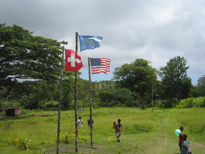 A ceremonial flag raising performed by members of the John Frum cargo cult on Tanna island in Vanuatu. …some folks are born, made to raise the flag? (image credit: Charmaine Tham)